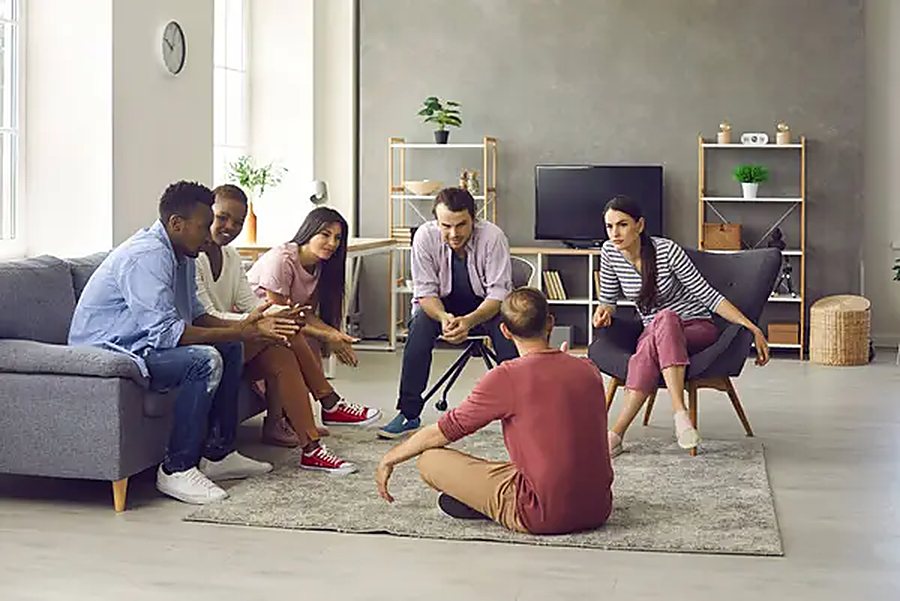 Young adults relaxing together at home